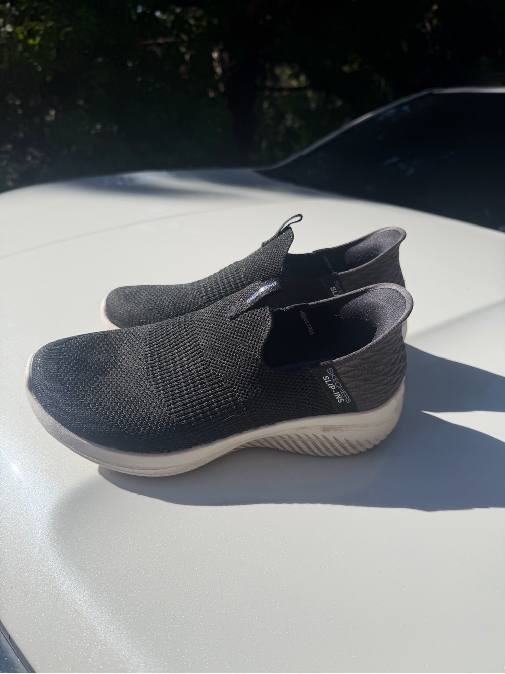 Skechers Black Knit Slip-On Sneakers with White Sole